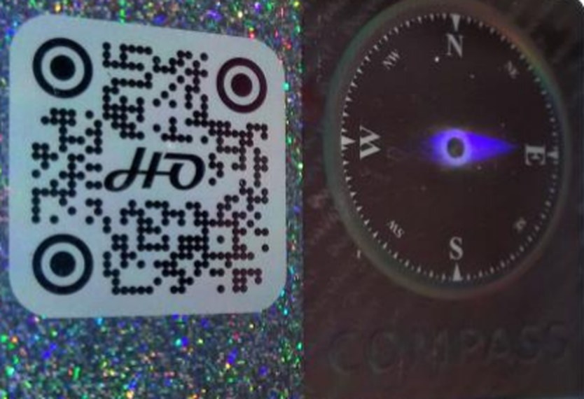 holoCOMPASS feature paired with a holographic QR code
